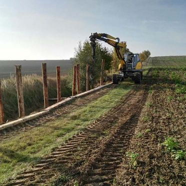 Böschungssicherung mit Holzpiloten